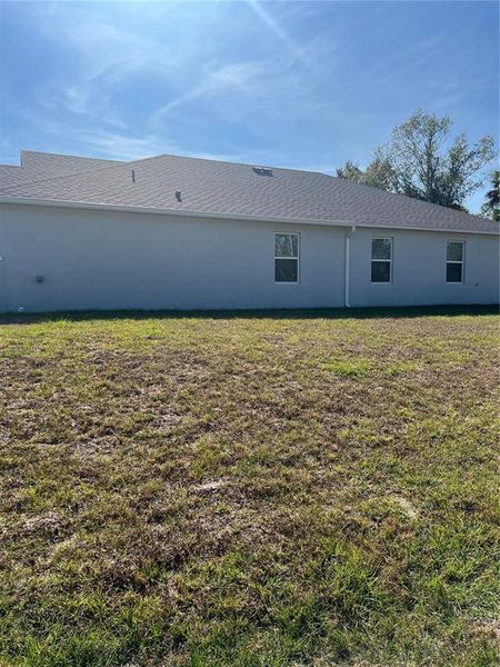 Exterior details and patio area of a home in , North Port (Image 24).