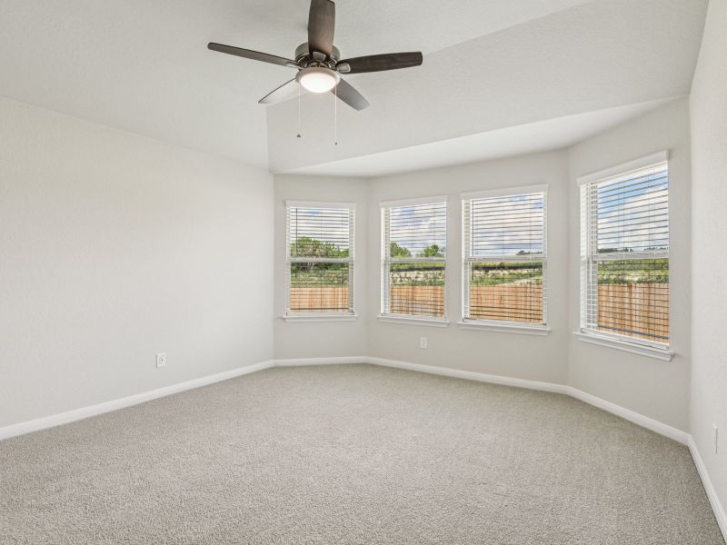 Primary suite in the Oleander floorplan at a Meritage Homes community.