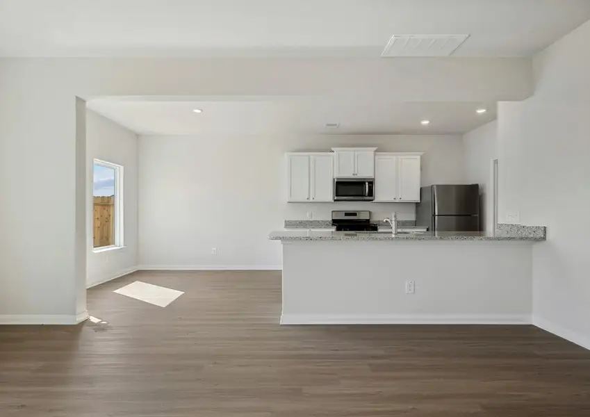 Dining room and adjoining kitchen