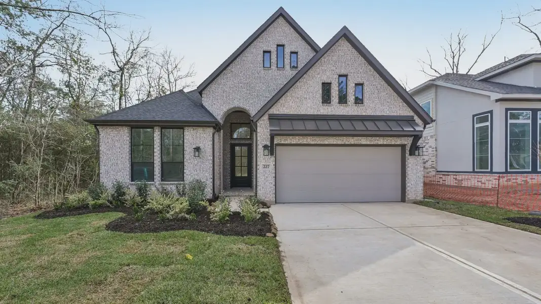 Representative exterior photo of a completed home built from the Summerton by Chesmar Homes in Audubon, Magnolia, TX (Image 1). Representative exterior photo of a completed home built from the Summerton by Chesmar Homes in Audubon, Magnolia, TX (Image 1).