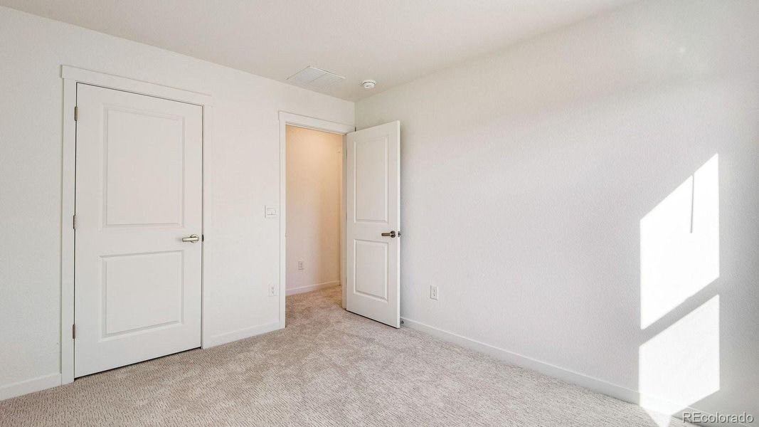 Spacious, unfurnished interior of a new home in Trails at Crowfoot, Parker (Image 39).