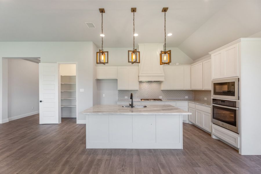 Representative furnished interior of a home built from the Cameron by UnionMain Homes in Cambridge Crossing, Celina (Image 12).