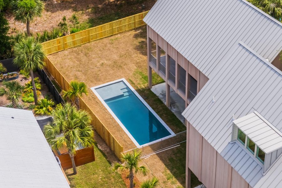 Exterior details and patio area of a home in , Edisto Island (Image 30).
