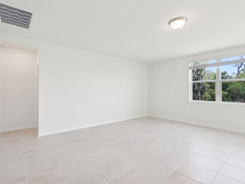 Spacious, unfurnished interior of a new home in The Reserve at Van Oaks, Auburndale (Image 26).
