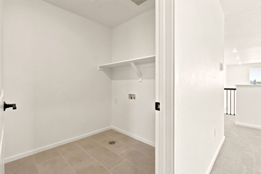 Spacious, unfurnished interior of a new home in Cordovan, Firestone (Image 31).