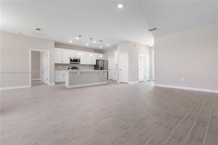 Spacious, unfurnished interior of a new home in , Palm Bay (Image 18). Spacious, unfurnished interior of a new home in , Palm Bay (Image 18).