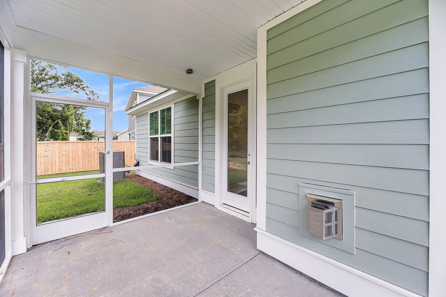 Exterior details and patio area of a home in Sweetgrass Station, Summerville (Image 19).