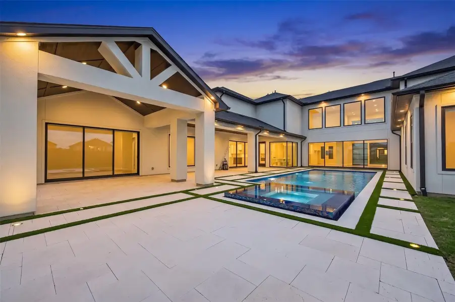Step outside to your very own private resort. The heated freshwater pool and spa create a luxurious outdoor oasis complete with elegant water features that provide both stunning visual appeal and soothing ambiance.