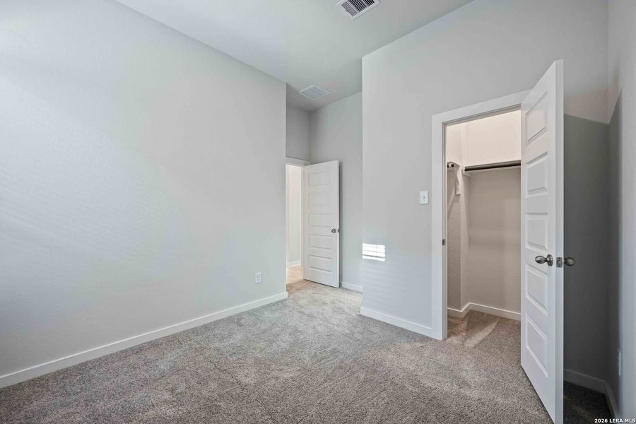 Spacious, unfurnished interior of a new home in Red Hawk Landing, San Antonio (Image 15).