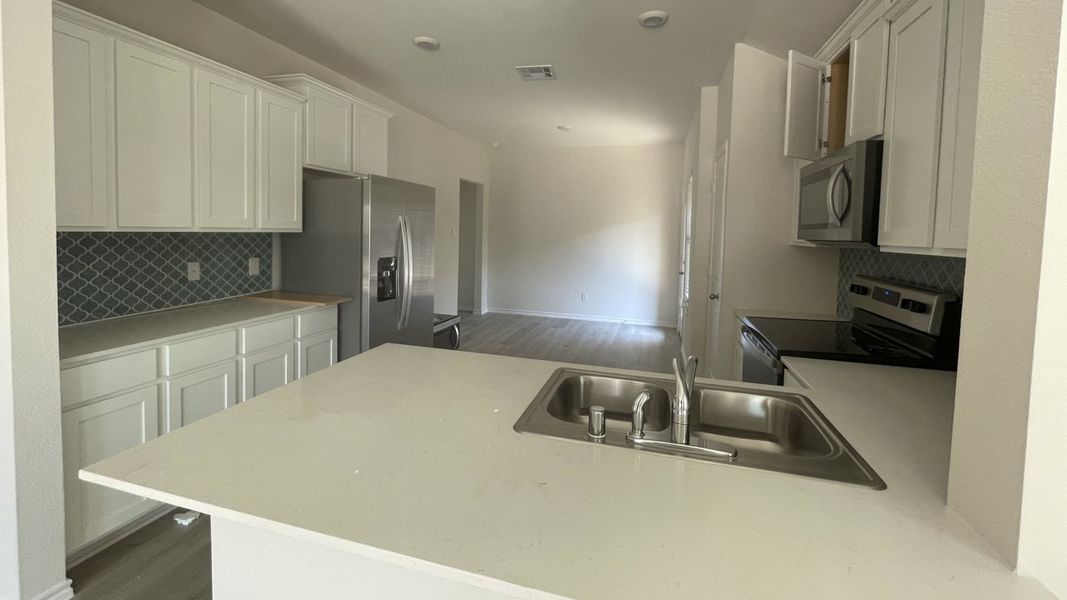 Representative furnished interior of a home built from the Sapphire by D.R. Horton in Elevon, Lavon (Image 5).