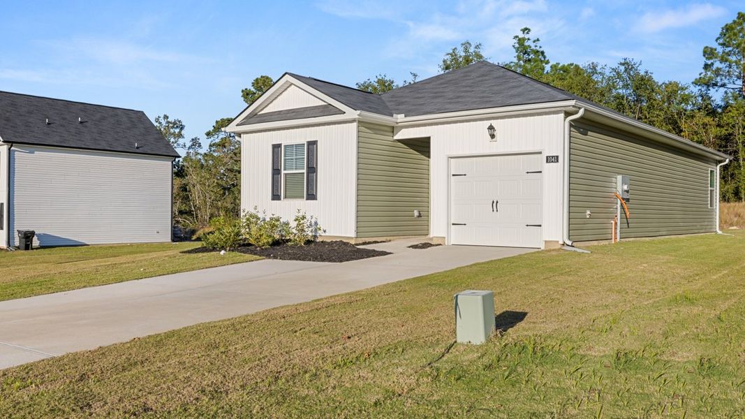 Front exterior of a new home in Bellemeade Landing, Augusta, GA, highlighting curb appeal (Image 1). Front exterior of a new home in Bellemeade Landing, Augusta, GA, highlighting curb appeal (Image 1).