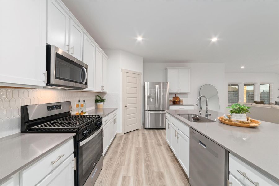 Furnished interior view inside a new home in Parks Edge, Missouri City (Image 31).
