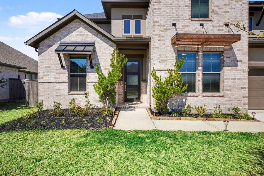 Exterior details and patio area of a home in Coastal Point, League City (Image 4). Exterior details and patio area of a home in Coastal Point, League City (Image 4).
