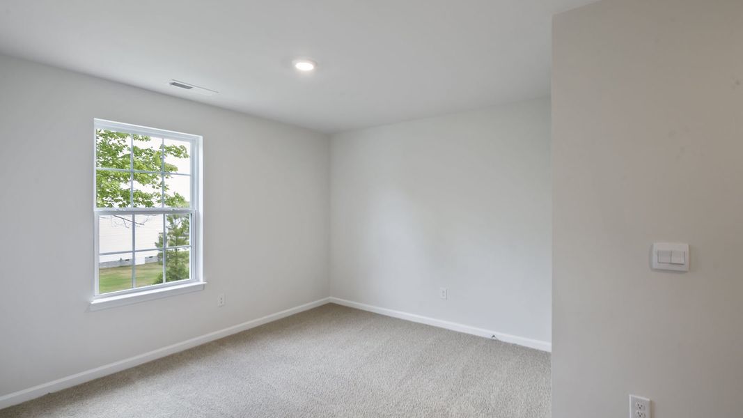 Spacious, unfurnished interior of a new home in Baker Farm, Youngsville (Image 26). Spacious, unfurnished interior of a new home in Baker Farm, Youngsville (Image 26).