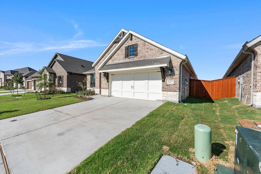 Front exterior of a new home in Morningstar, Aledo, TX, highlighting curb appeal (Image 27).