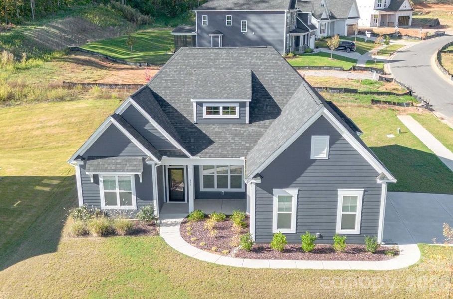 Front exterior of a new home in Red Hill, Concord, NC, highlighting curb appeal (Image 20). Front exterior of a new home in Red Hill, Concord, NC, highlighting curb appeal (Image 20).
