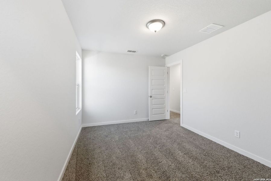 Spacious, unfurnished interior of a new home in Talley Fields, San Antonio (Image 22).
