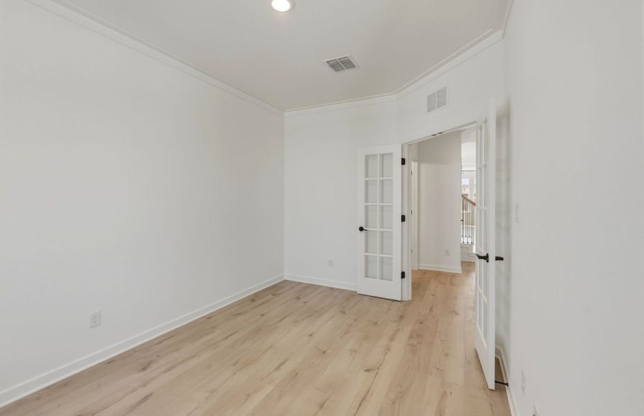 Representative unfurnished interior of a home built from the Lochridge by Pulte Homes in Woodside, Georgetown (Image 17).