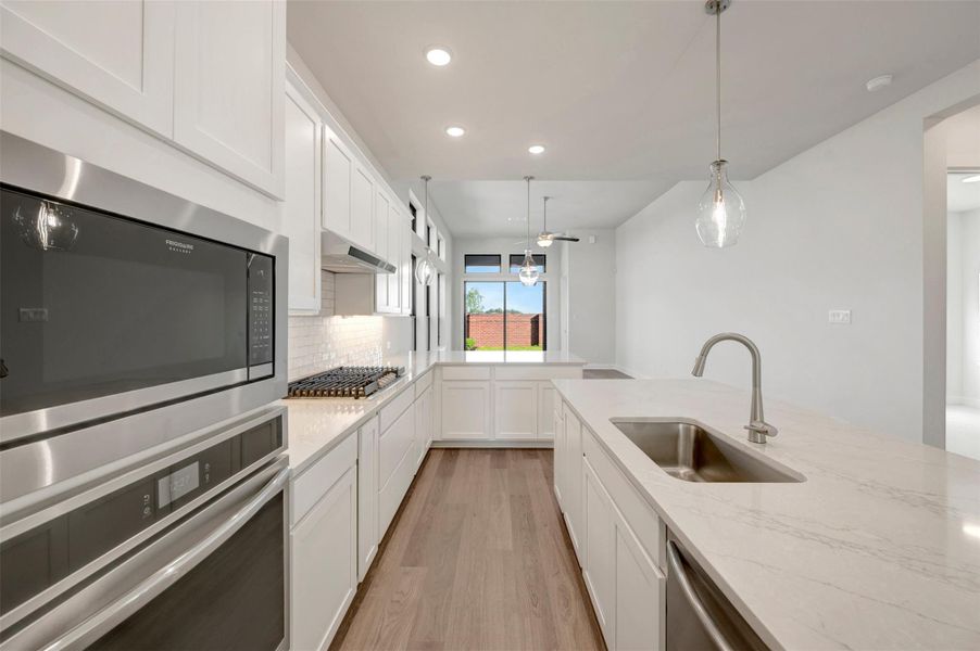 Furnished interior view inside a new home in Sienna - Grove Collection, Missouri City (Image 10).