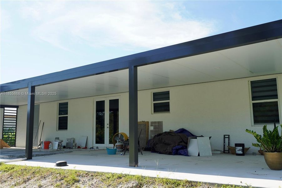 Front exterior of a new home in , Lehigh Acres, FL, highlighting curb appeal (Image 20).