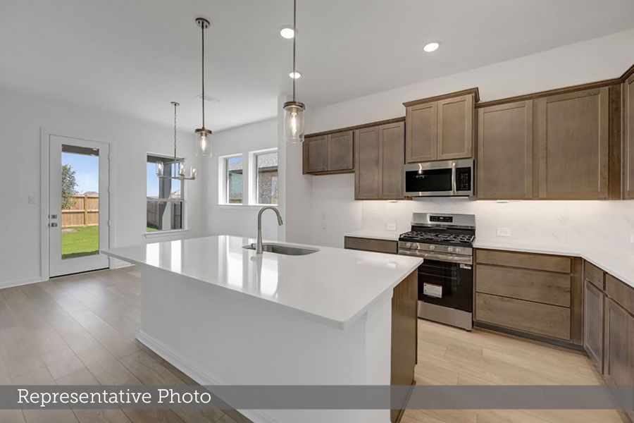 Furnished interior view inside a new home in Meridiana - Terrace Collection, Manvel (Image 3).