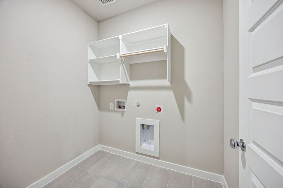 Utility Room in the Willow home plan by Trophy Signature Homes – REPRESENTATIVE PHOTO