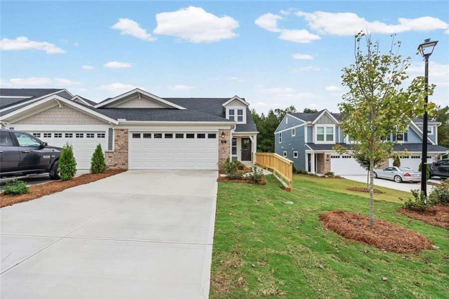 Front exterior of a new home in Villas at Gold Creek, Dawsonville, GA, highlighting curb appeal (Image 21).