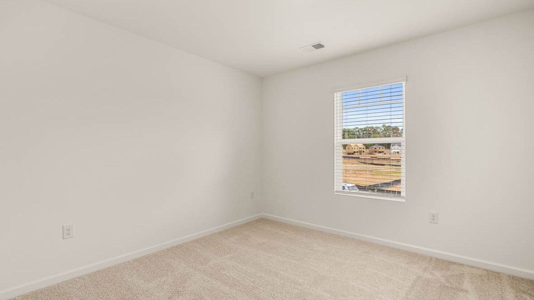 Representative unfurnished interior of a home built from the Dennis by D.R. Horton in Glenmaye, Hampton (Image 32).