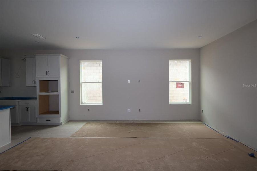 In-progress construction of a new home in Lake Star at Ovation, Winter Garden, FL (Image 17).