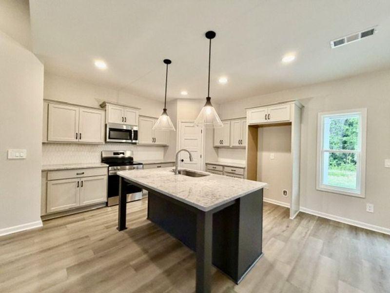 Furnished interior view inside a new home in Oakview, Pine Mountain (Image 3).