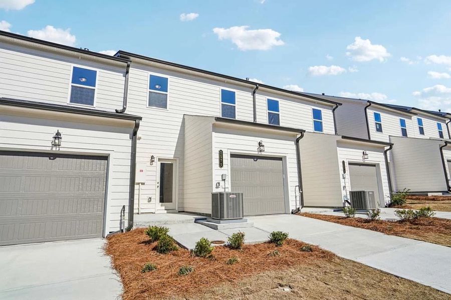 Rear Exterior with one Car Garage Rear Exterior with one Car Garage