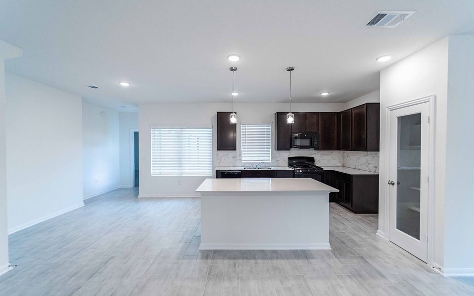 Furnished interior view inside a new home in Brooklands, Hutto (Image 3).