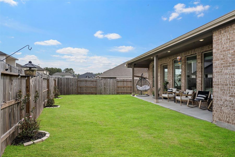Exterior details and patio area of a home in The Trails, New Caney (Image 23). Exterior details and patio area of a home in The Trails, New Caney (Image 23).