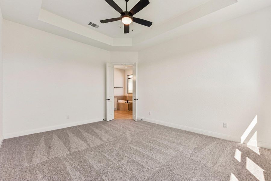 Spacious, unfurnished interior of a new home in 6 Creeks, Kyle (Image 30).