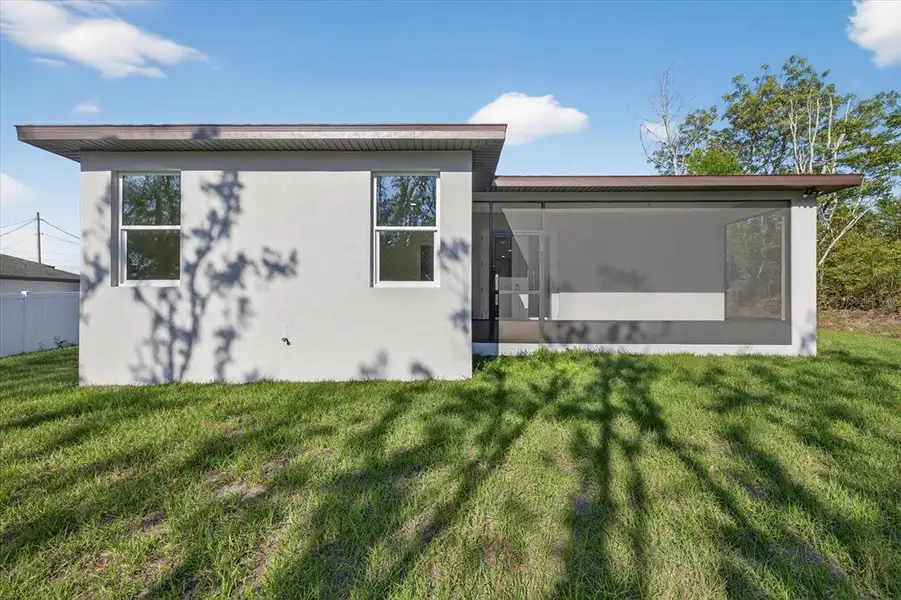 Exterior details and patio area of a home in , Spring Hill (Image 4).