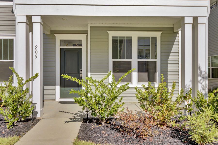 Exterior details and patio area of a home in Six Oaks, Summerville (Image 3).