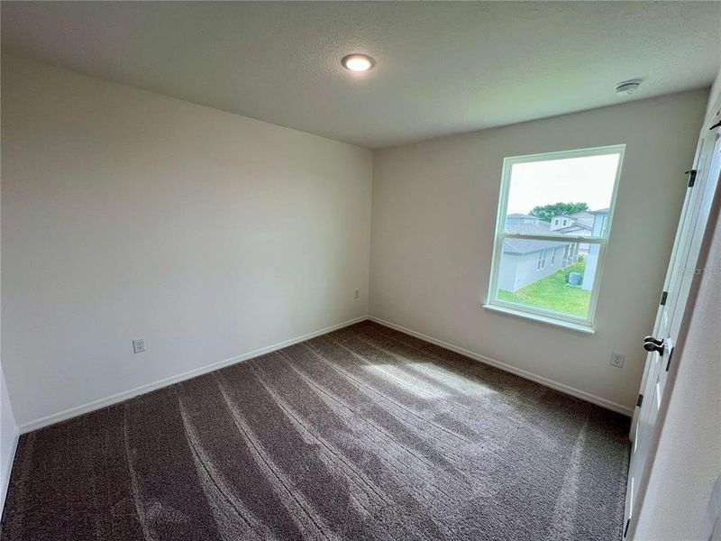 Spacious, unfurnished interior of a new home in Villamar, Winter Haven (Image 27).