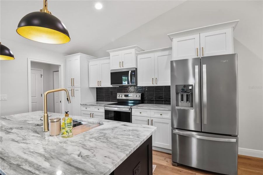 Furnished interior view inside a new home in , Dunnellon (Image 27).