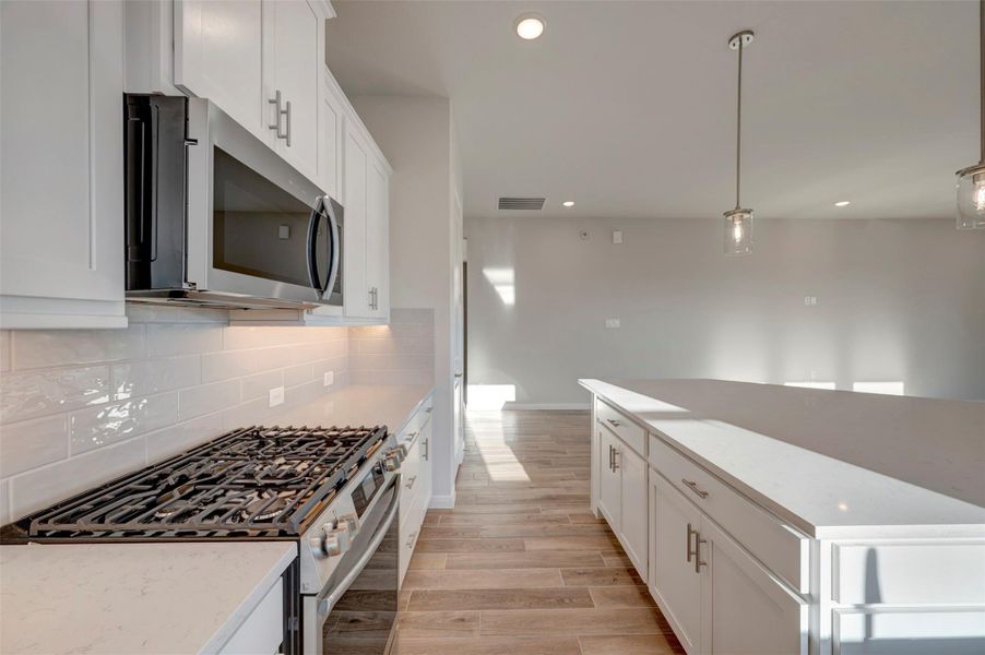 Furnished interior view inside a new home in The Grand Prairie 50’, Hockley (Image 9).