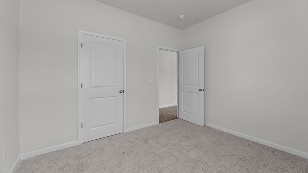 Spacious, unfurnished interior of a new home in Beaver Dam Crossing, Bailey (Image 14). Spacious, unfurnished interior of a new home in Beaver Dam Crossing, Bailey (Image 14).