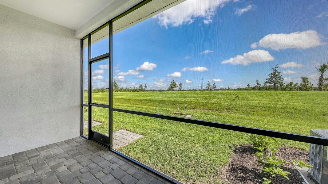 Exterior details and patio area of a home in Palm Grove Real Estate and Homes for Sale in Lakewood Ranch, FL - Neal Communities, Lakewood Ranch (Image 32).