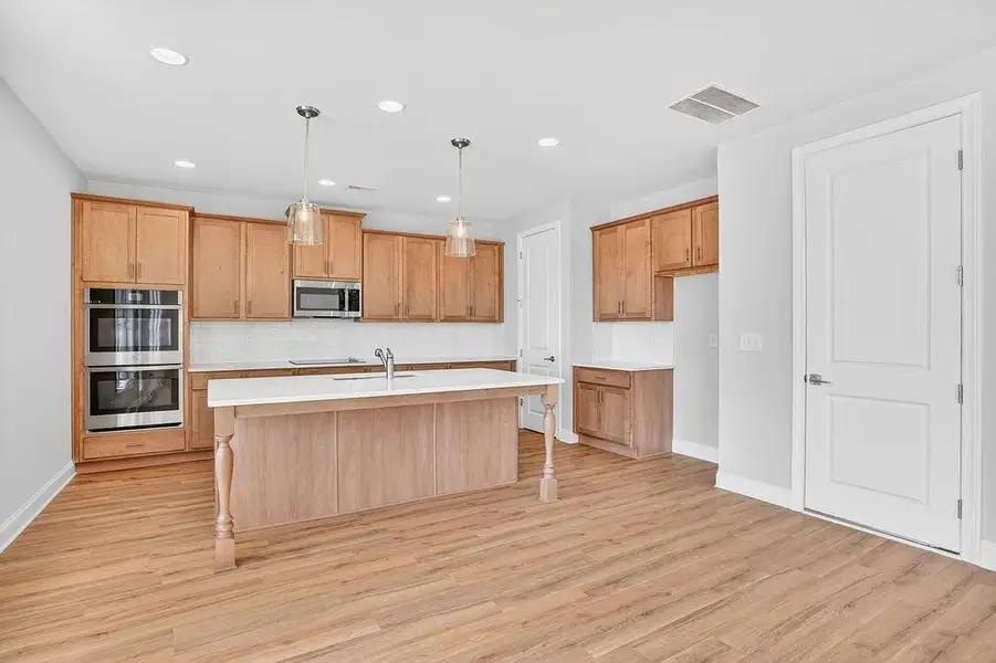 Furnished interior view inside a new home in , Homer (Image 3). Furnished interior view inside a new home in , Homer (Image 3).