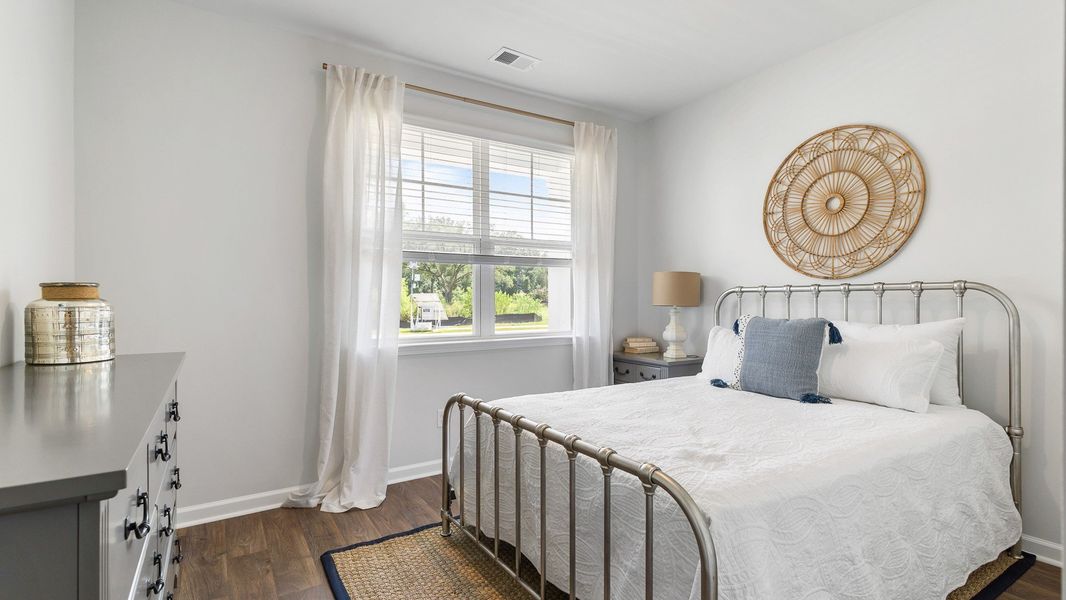 Furnished interior view inside a new home in Pine Hills at Cane Bay, Summerville (Image 10). Furnished interior view inside a new home in Pine Hills at Cane Bay, Summerville (Image 10).