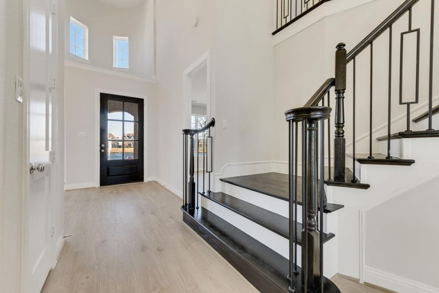 Representative unfurnished interior of a home built from the Royal Martinique by Grand Homes in Edgewater, Fate (Image 10).