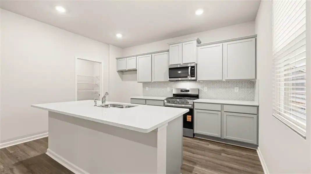 Furnished interior view inside a new home in Preserve at Dove Creek, Statham (Image 6).