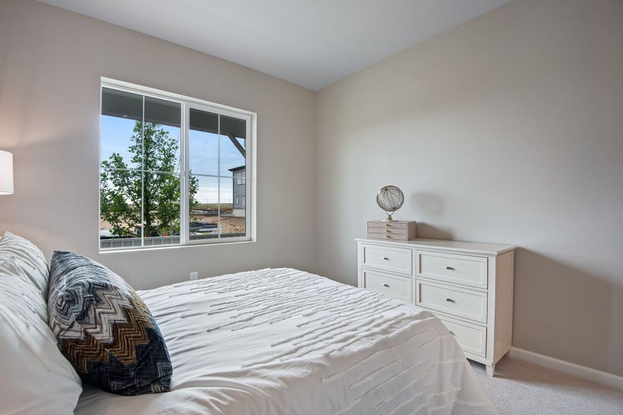 Furnished interior view inside a new home in Reunion, Commerce City (Image 39).