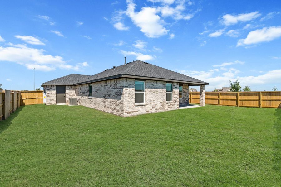 Exterior details and patio area of a home in Sunterra Lakes, Brookshire (Image 3). Exterior details and patio area of a home in Sunterra Lakes, Brookshire (Image 3).