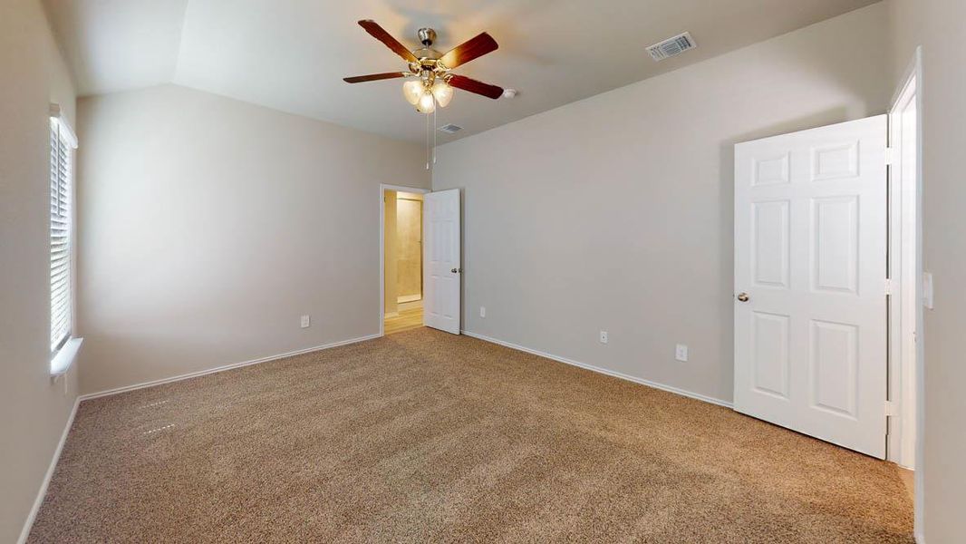 A quiet retreat with a soaring vaulted ceiling and a cooling ceiling fan for ultimate comfort. A quiet retreat with a soaring vaulted ceiling and a cooling ceiling fan for ultimate comfort.
