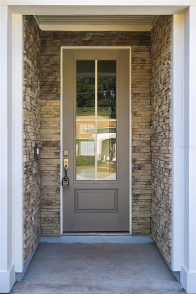 Exterior details and patio area of a home in Palm Coast Homes, Palm Coast (Image 21).