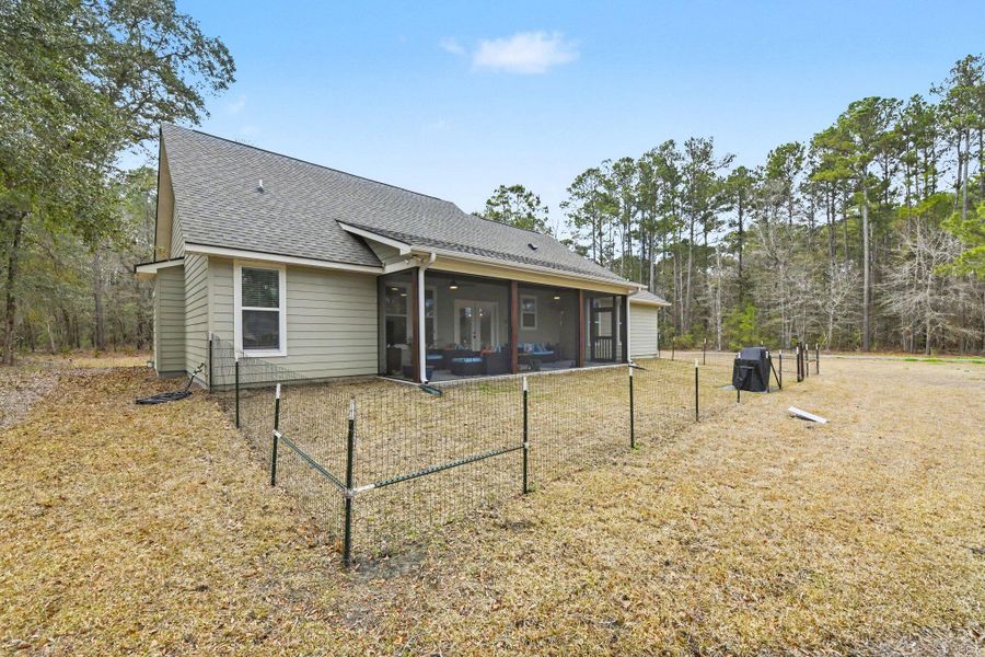 Exterior details and patio area of a home in , Johns Island (Image 26).